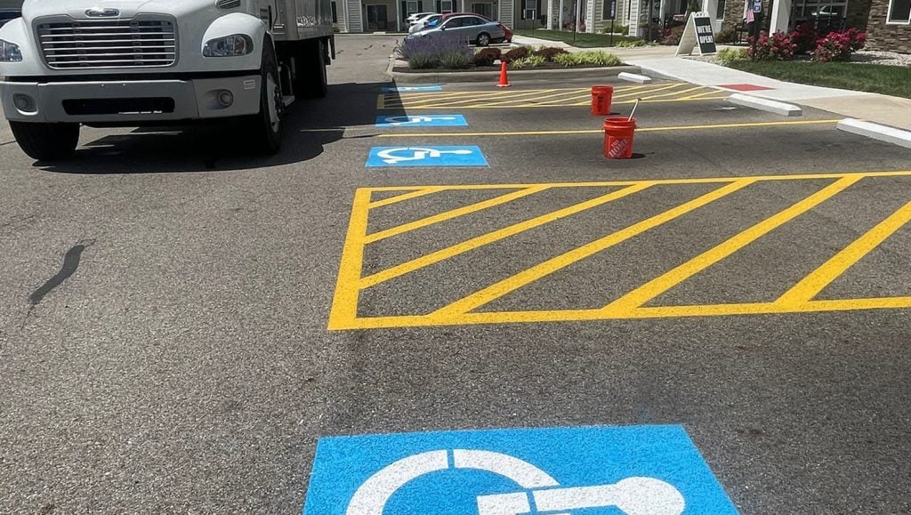freshly painted yellow lines for parking lot