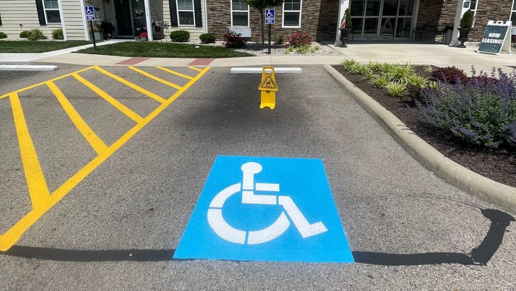 close-up of ADA compliance parking spots at apartment complex