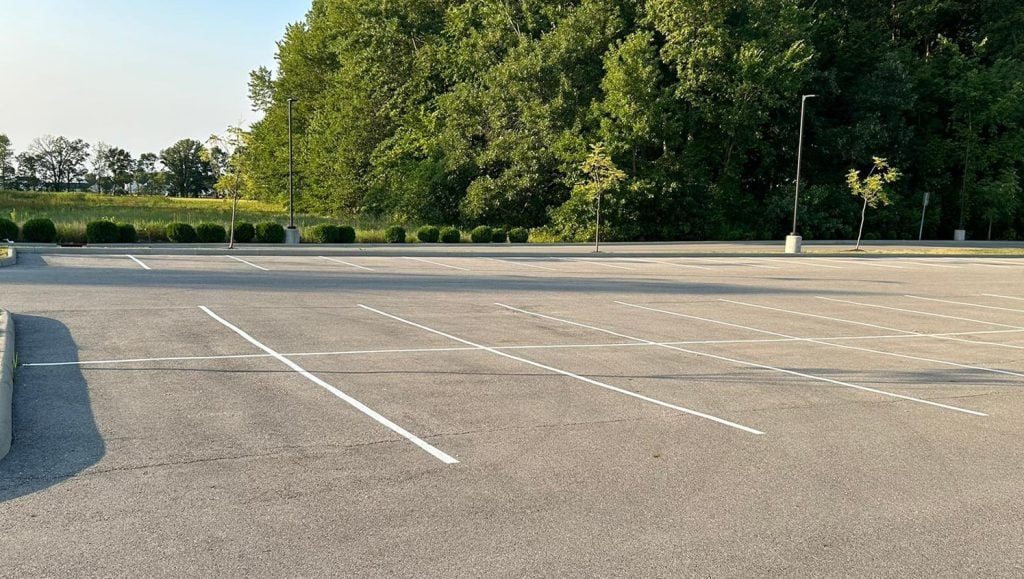white arrow freshly painted for Dublin City Schools parking lot