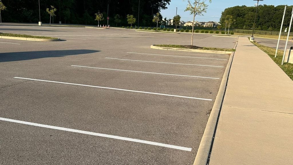 close-up of white arrow for Dublin City Schools parking lot