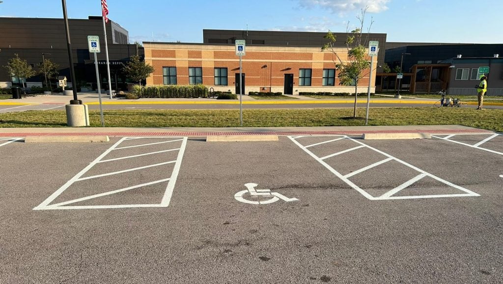 ada compliance parking spots in front of Dublin City Schools parking lot
