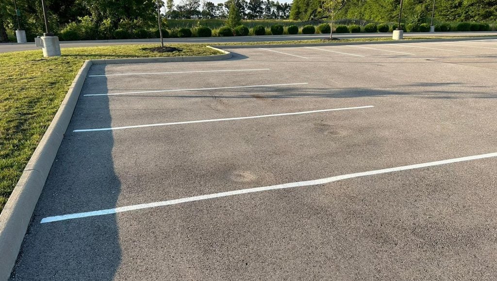 close-up of freshly painted curb for Dublin City Schools
