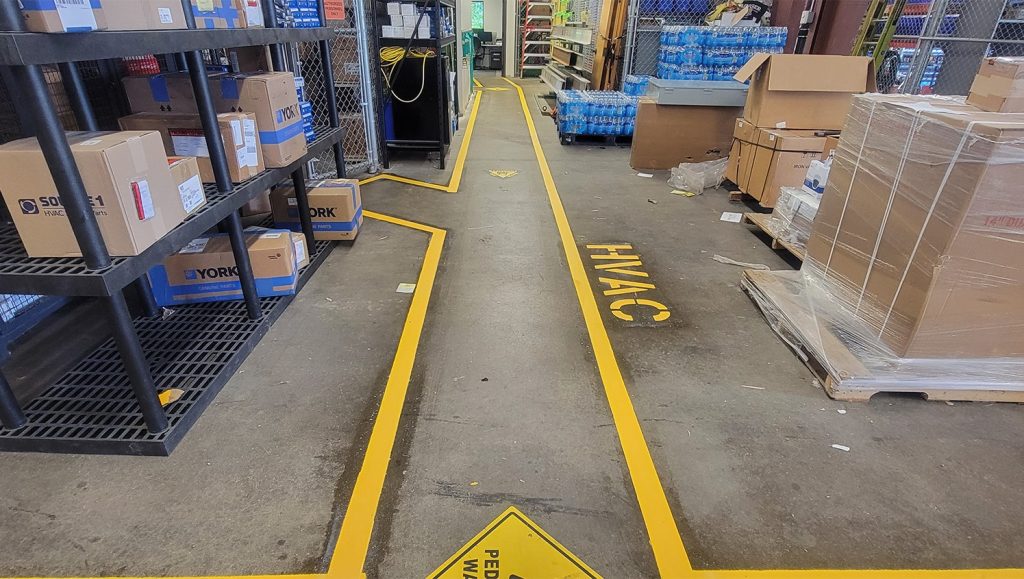 freshly painted markings inside of warehouse