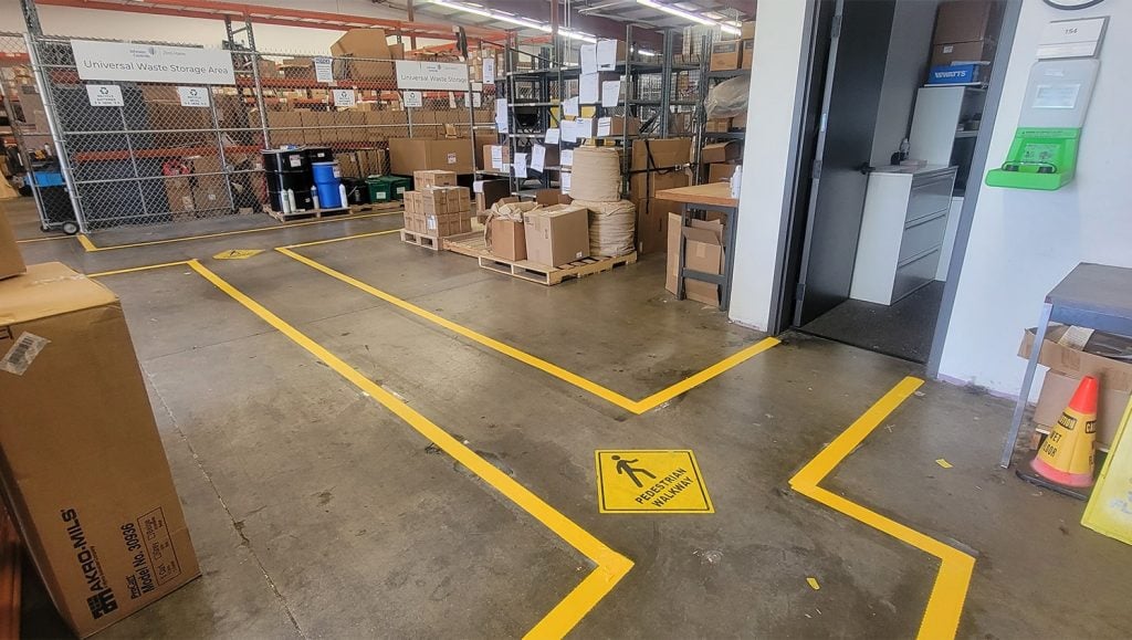 freshly painted markings inside of warehouse
