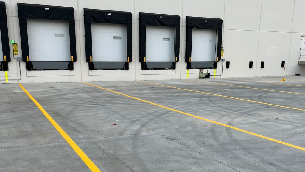 freshly painted line markings for DB Schenker in canal whinchester