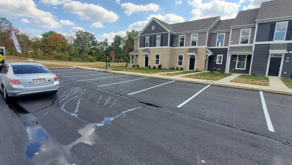 close-up view of Fenimore Apartments parking lot freshly painted