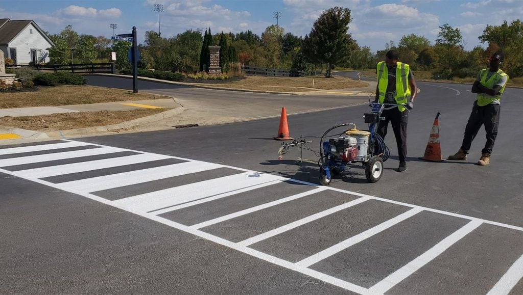 freshly painted line markings for Fenimore Apartments parking lot close-up