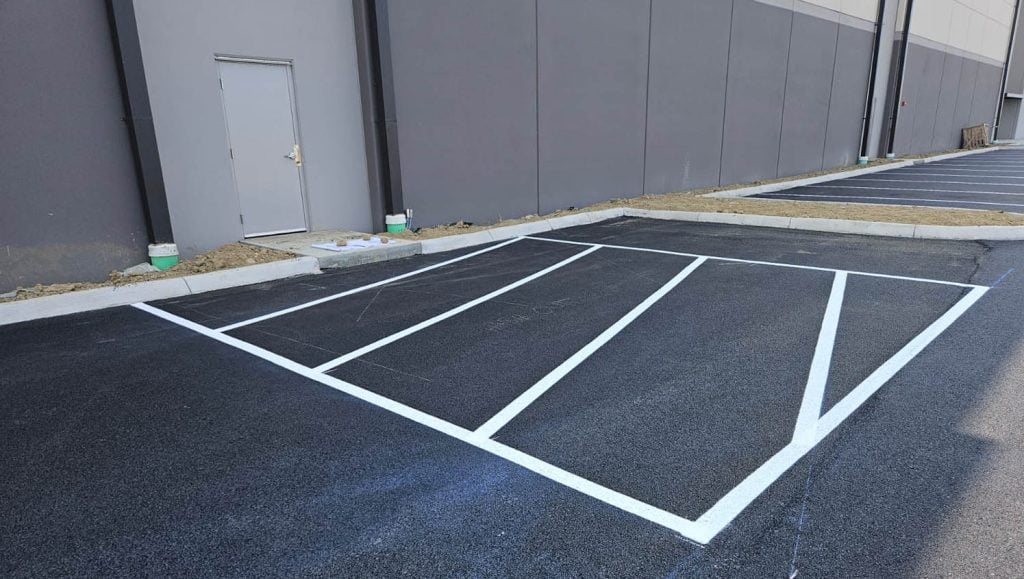parking spots freshly painted for Shell Oil Company