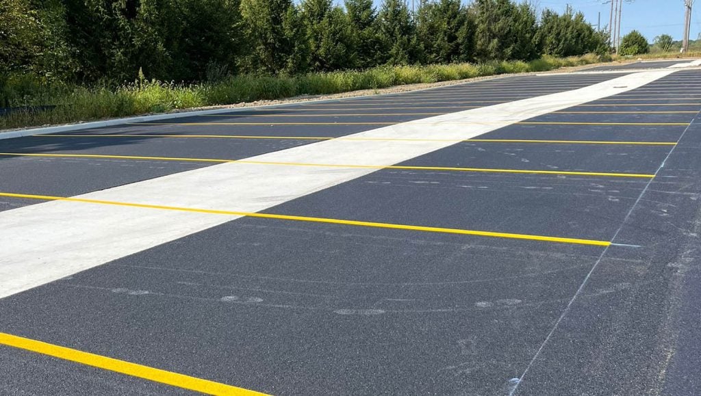 close-up of freshly painted lines for Shell Oil Company