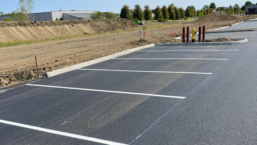 freshly painted yellow lines for Shell Oil Company parking lot