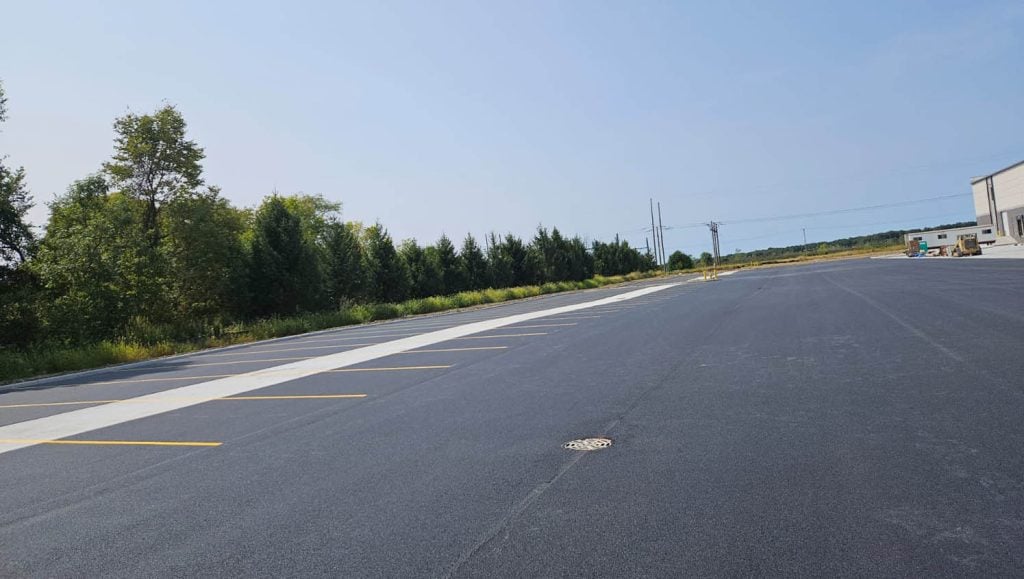 close-up of freshly painted yellow line markings