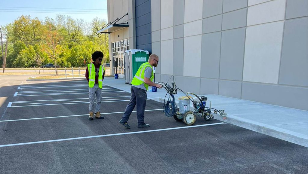ada compliance parking spots freshly painted for Stelzer Road Warehouse parking lot