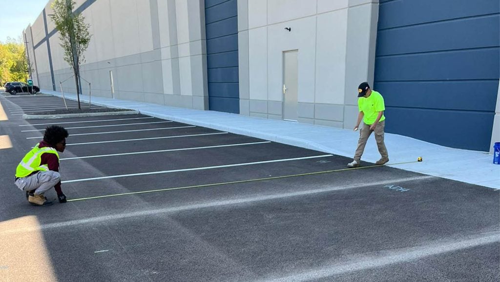freshly painted crosswalk for Stelzer Road Warehouse parking lot