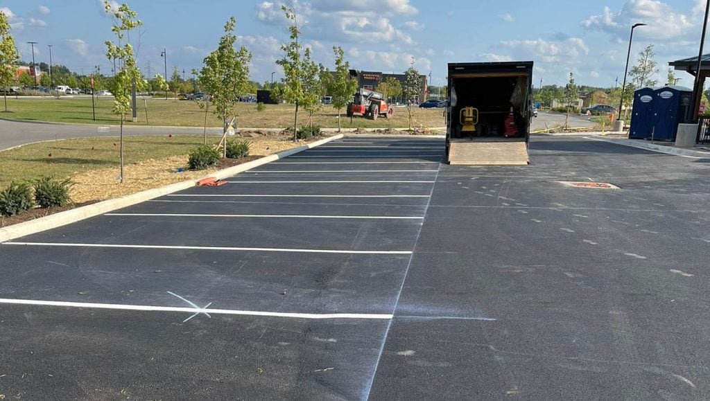 parking spots freshly painted for Texas Roadhouse