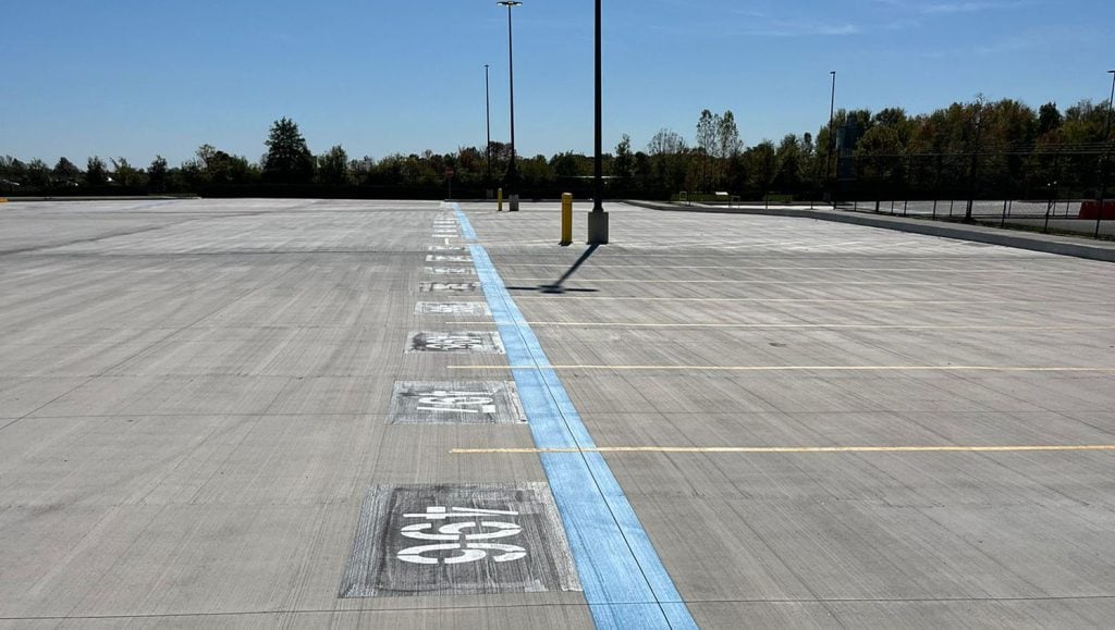 Amazon parking lot with new parking stops installed