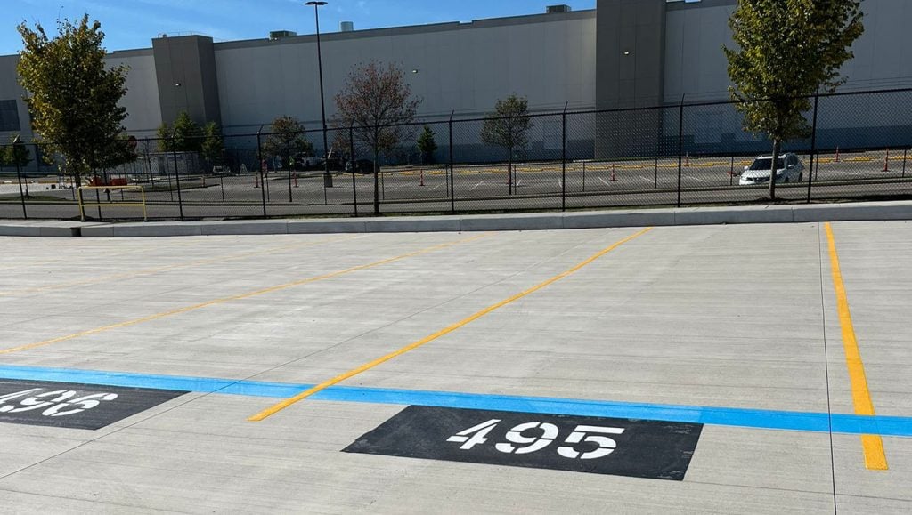 freshly painted line markings for Amazon parking lot