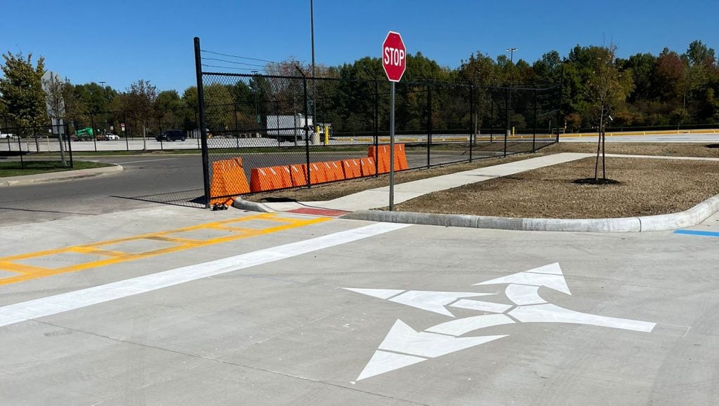 freshly painted parking spots and stops installed for Amazon parking lot