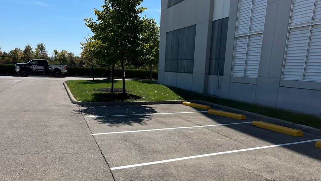close-up of parking stops newly installed for Amazon