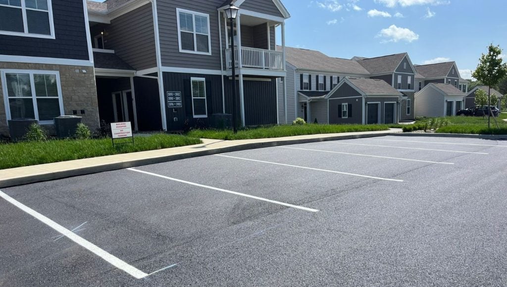 Orange Summit Apartments parking lot freshly painted