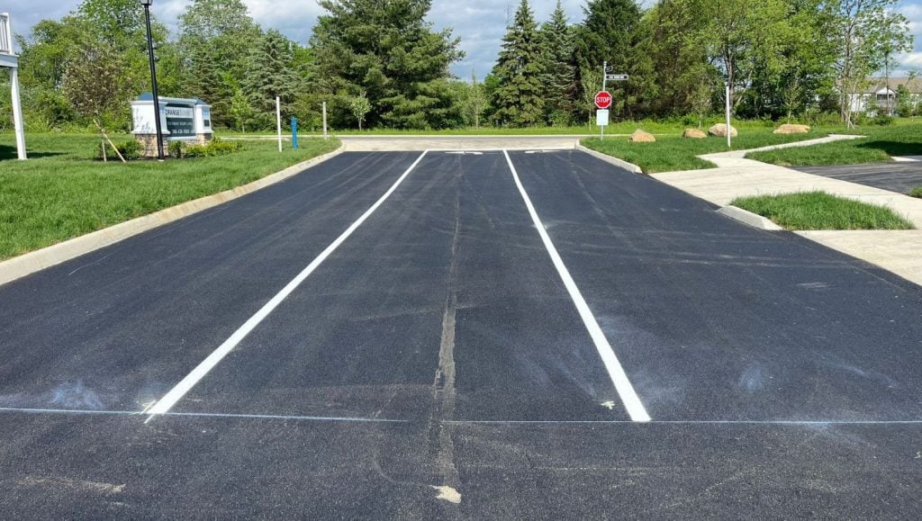 line marking freshly painted for Orange Summit Apartments parking lot