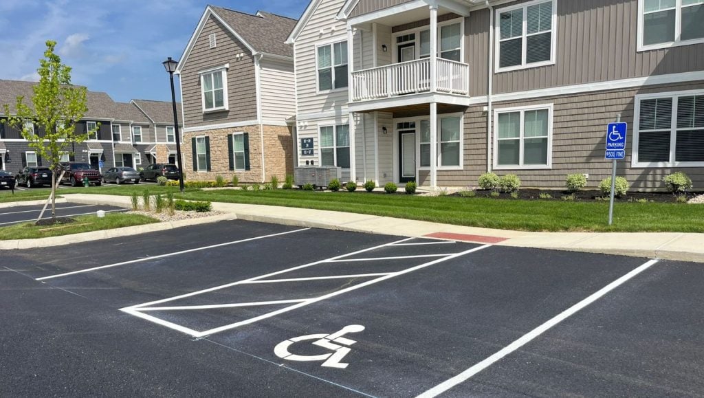 ada compliance parking spots freshly painted for Orange Summit Apartments parking lot