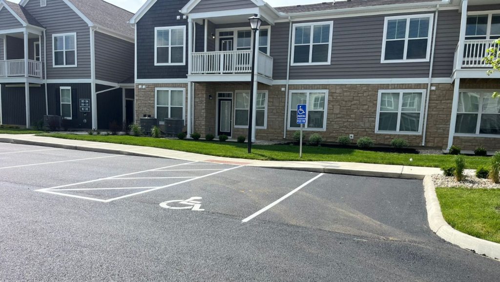 ada compliance parking spots for Orange Summit Apartments parking lot