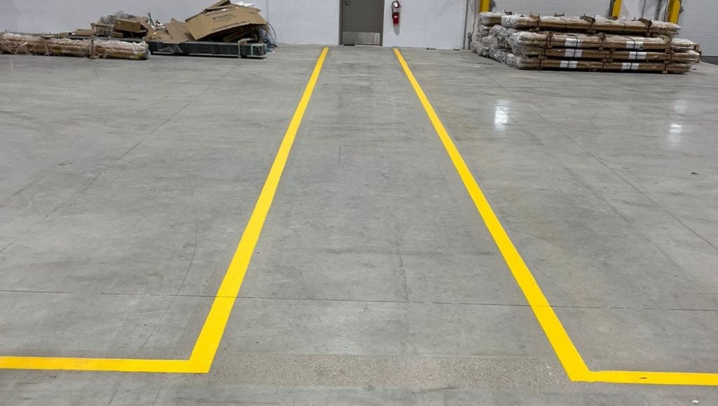 yellow line striping freshly painted for NEFCO Columbus