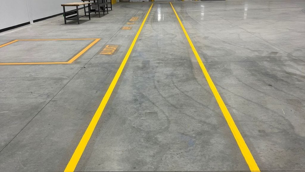 yellow line markings for NEFCO Columbus warehouse freshly painted