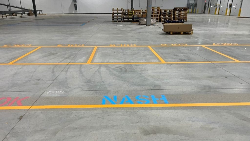 close-up of warehouse floor markings for NEFCO Columbus