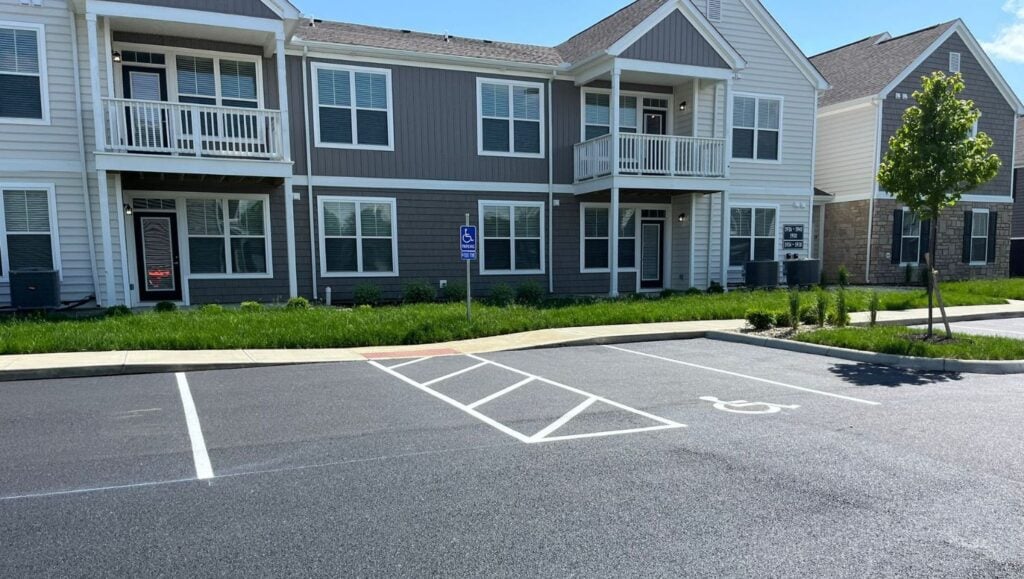close-up of ada compliance parking spots freshly painted