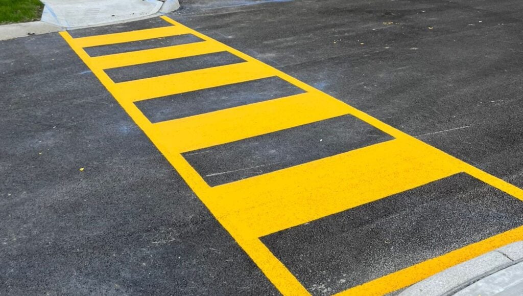 close-up of yellow crosswalk freshly painted for VanTrust