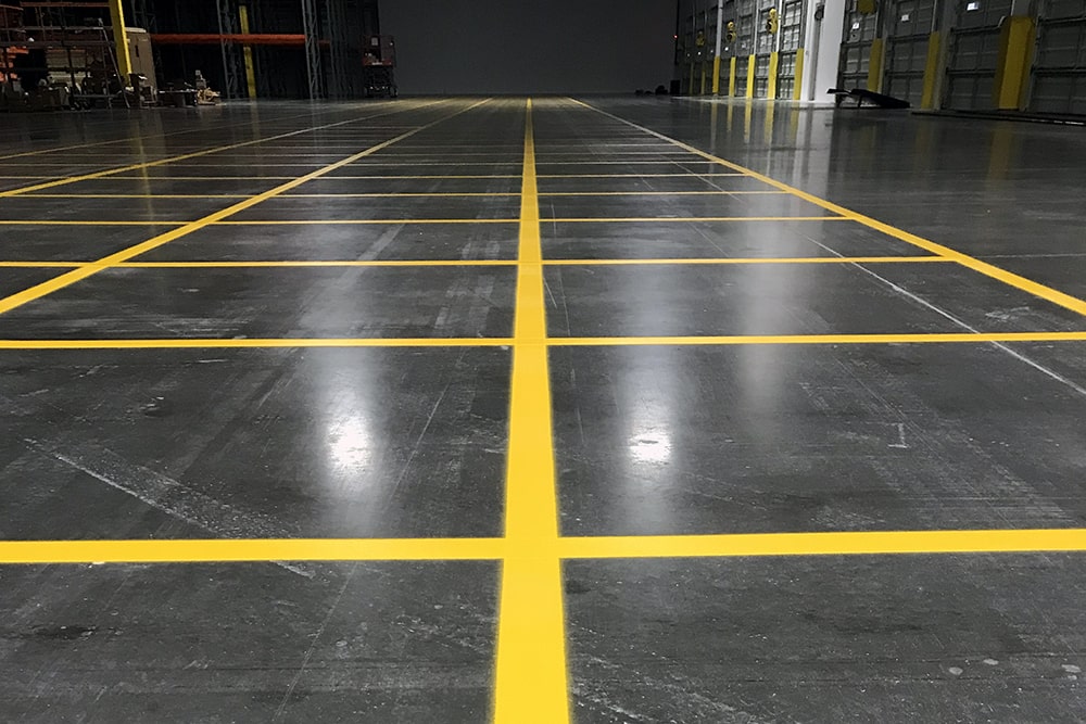 closeup of new warehouse markings inside American Logistic Services