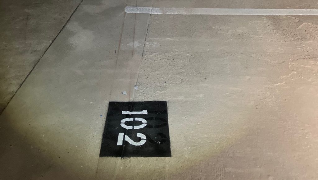 parking spots freshly painted for Global Advance parking lot