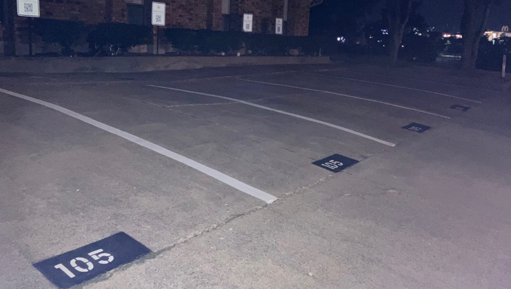 close-up of freshly painted parking spots for Global Advance parking lot