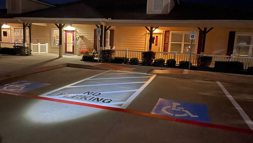 parking spots freshly painted for The Kid's Corral parking lot