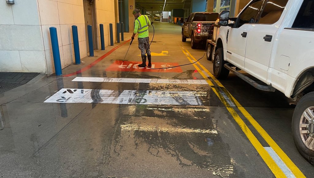 G-FORCE® employee pressure washing The Shops at Legacy West