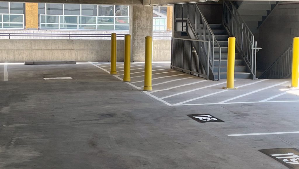 striped ev charging station stall