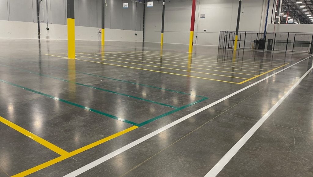 close-up of freshly painted line markings for Pratt & Whitney warehouse