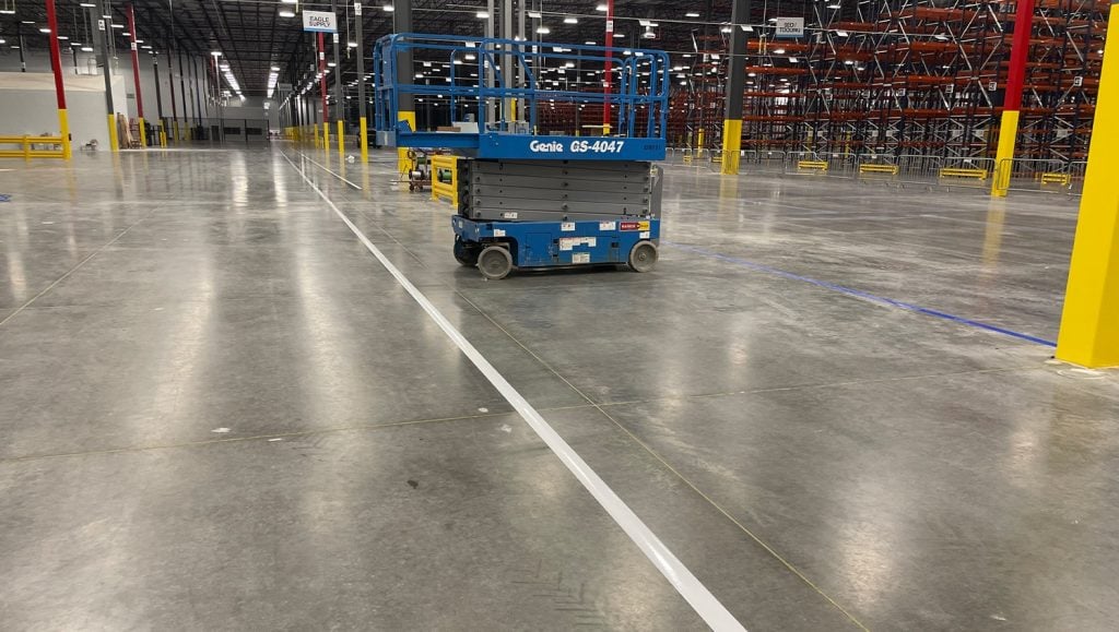 freshly painted line markings with machine