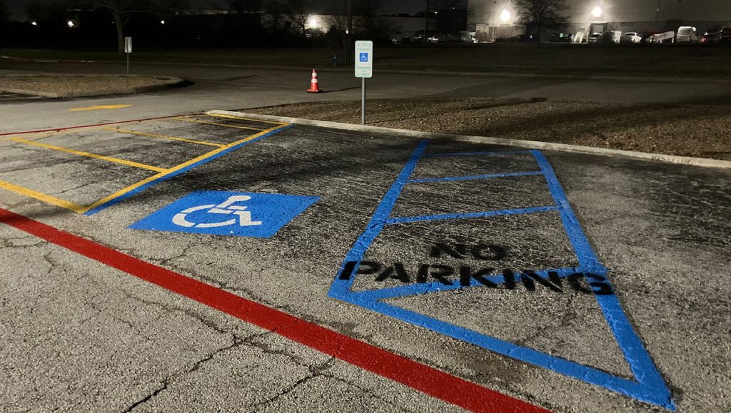 ada compliance parking spots freshly painted for Airborne Inc parking lot