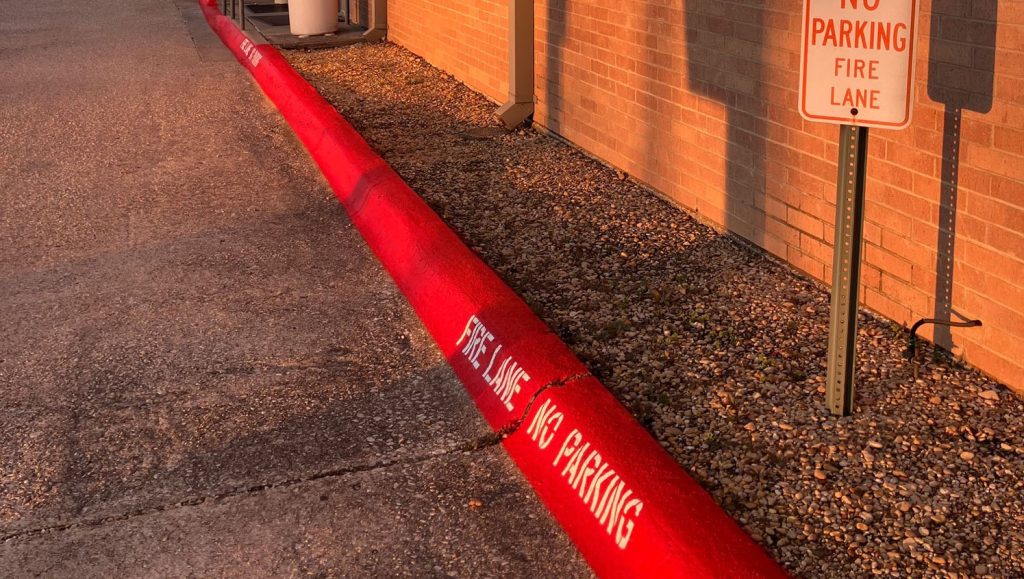 fire lane striping freshly painted for Airborne Inc