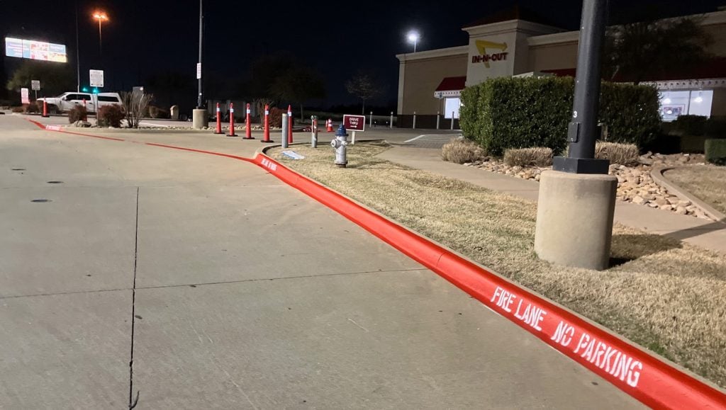 fire lane striping freshly painted for In-N-Out parking lot