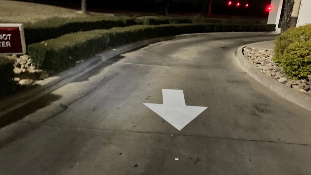 white arrow freshly painted for In-N-Out parking lot