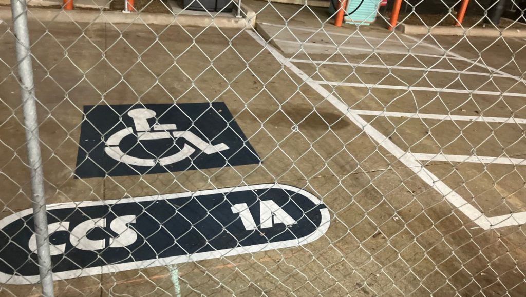 close-up front view of ada compliance and ev charging markings