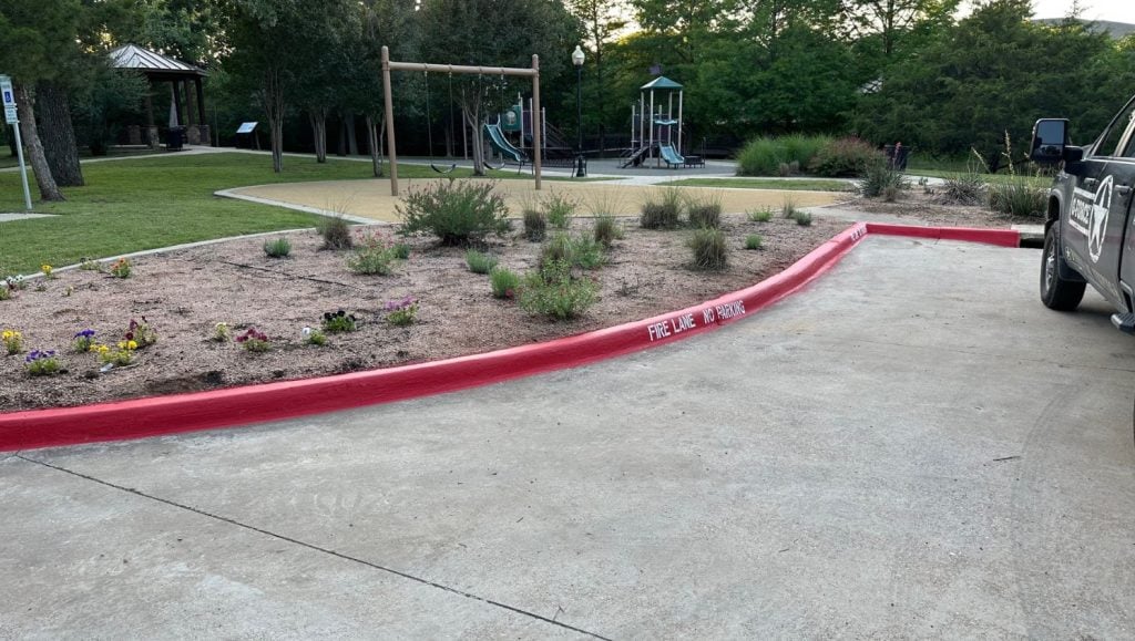 freshly painted fire lane striping for Donald R. Barg Park parking lot