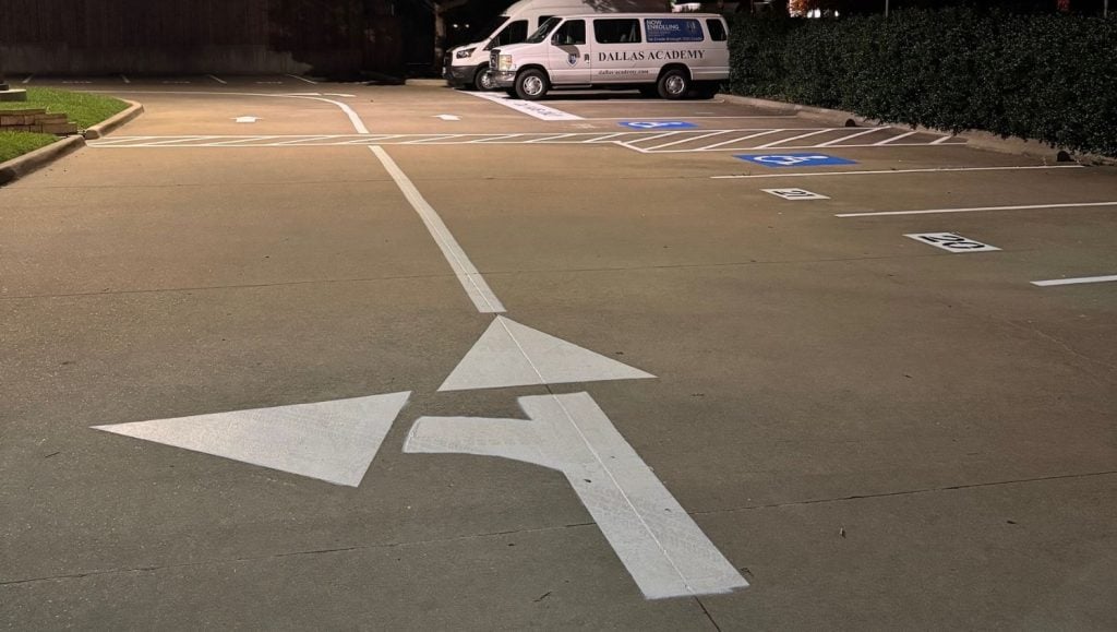 close-up of line markings freshly painted for Dallas Academy parking lot