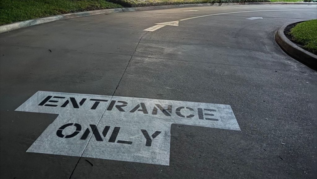 entrance only freshly painted for Dallas Academy parking lot