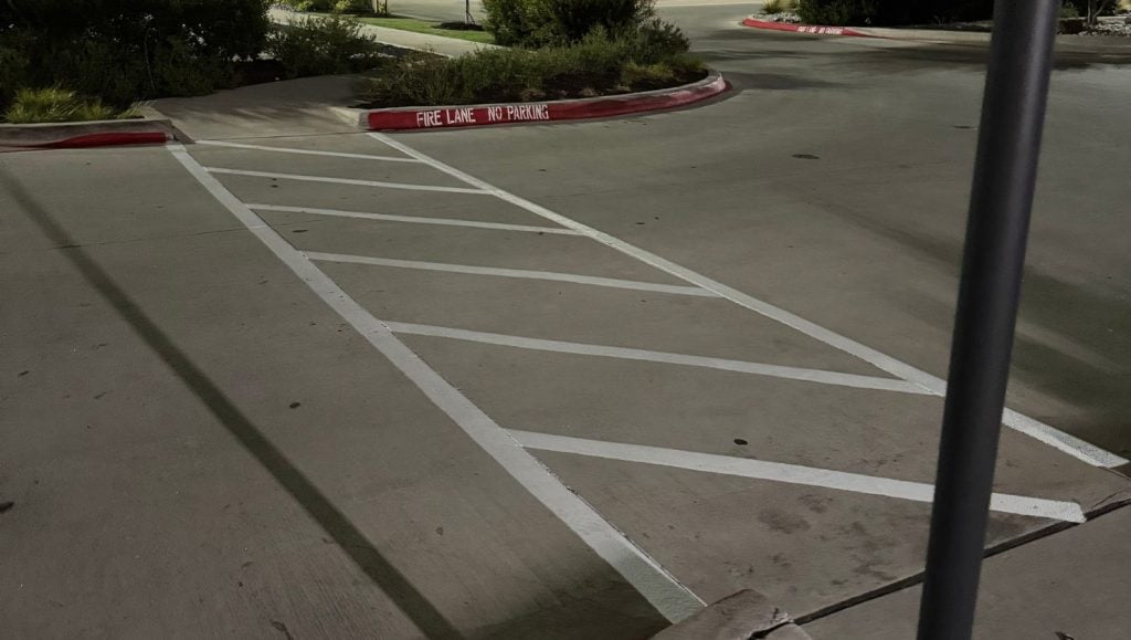 cross walk freshly painted on Preston Park Village parking lot