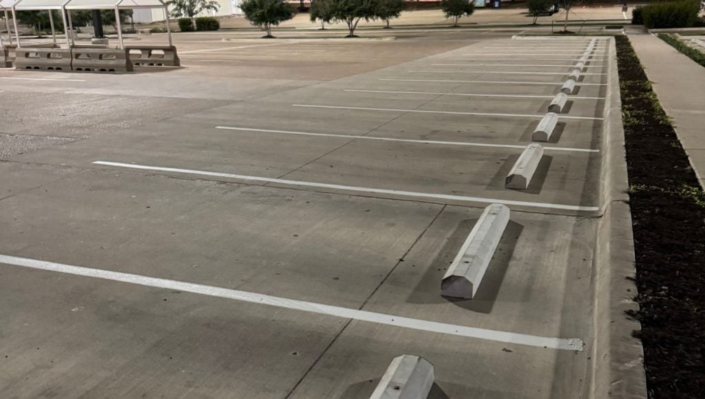 close-up of parking spots freshly painted for Preston Park Village parking lot