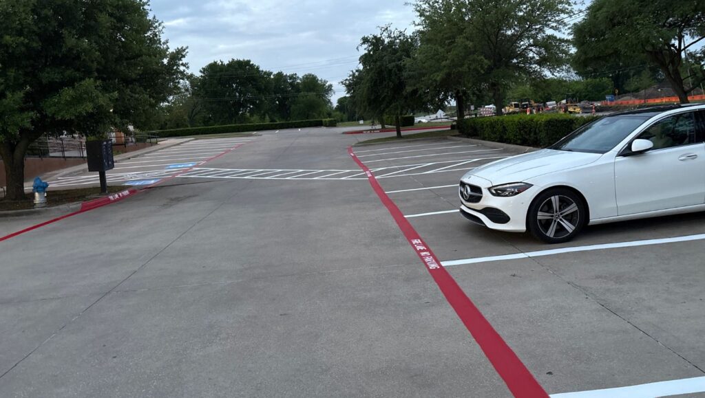 close-up of fire lane striping freshly painted for New Horizons Center for Healing